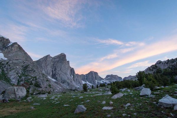 Morning light breaks over the snow speckled Ambush Peak in the East Fork Valley of the Wind River Range. 