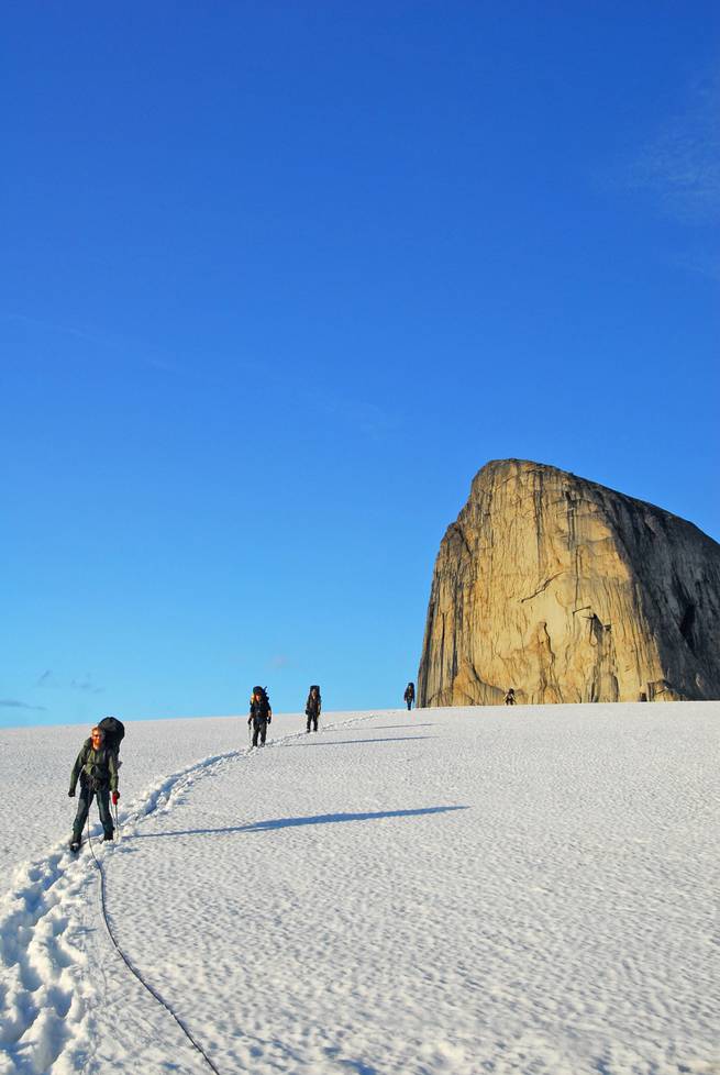 pascal_beauvais_yk_106-edit.jpg__655x5000_q70_subject_location-720,1214_subsampling-2 Students hike down a snowy slope while mountaineering in the Yukon.