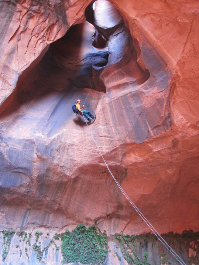 philip-kenney-rm-9.jpg__655x5000_q70_subject_location-1006,1065_subsampling-2 A student rappelling down the spectacular Golden Cathedral in Neon Canyon.