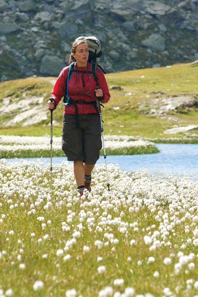 Woman hiking in Italy's Dolomites.