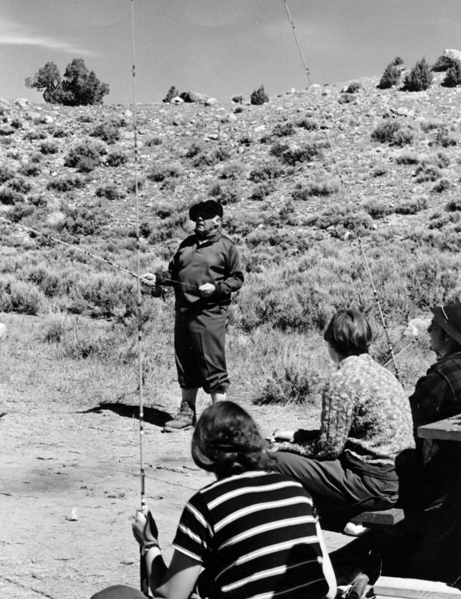 Paul Petzoldt teaching early NOLS students how to fly fish.
