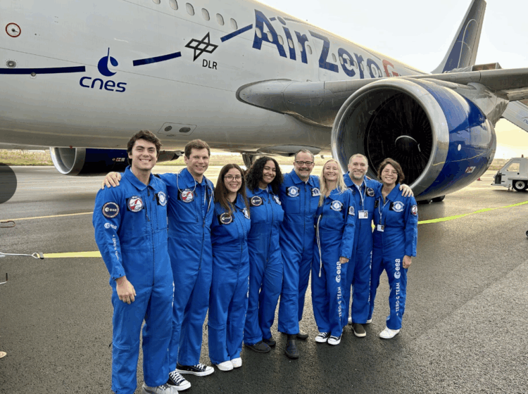 Dr. Stuart Harris, fifth from left, poses with other members of parabolic flight crew, testing weightlessness and medicine in space.