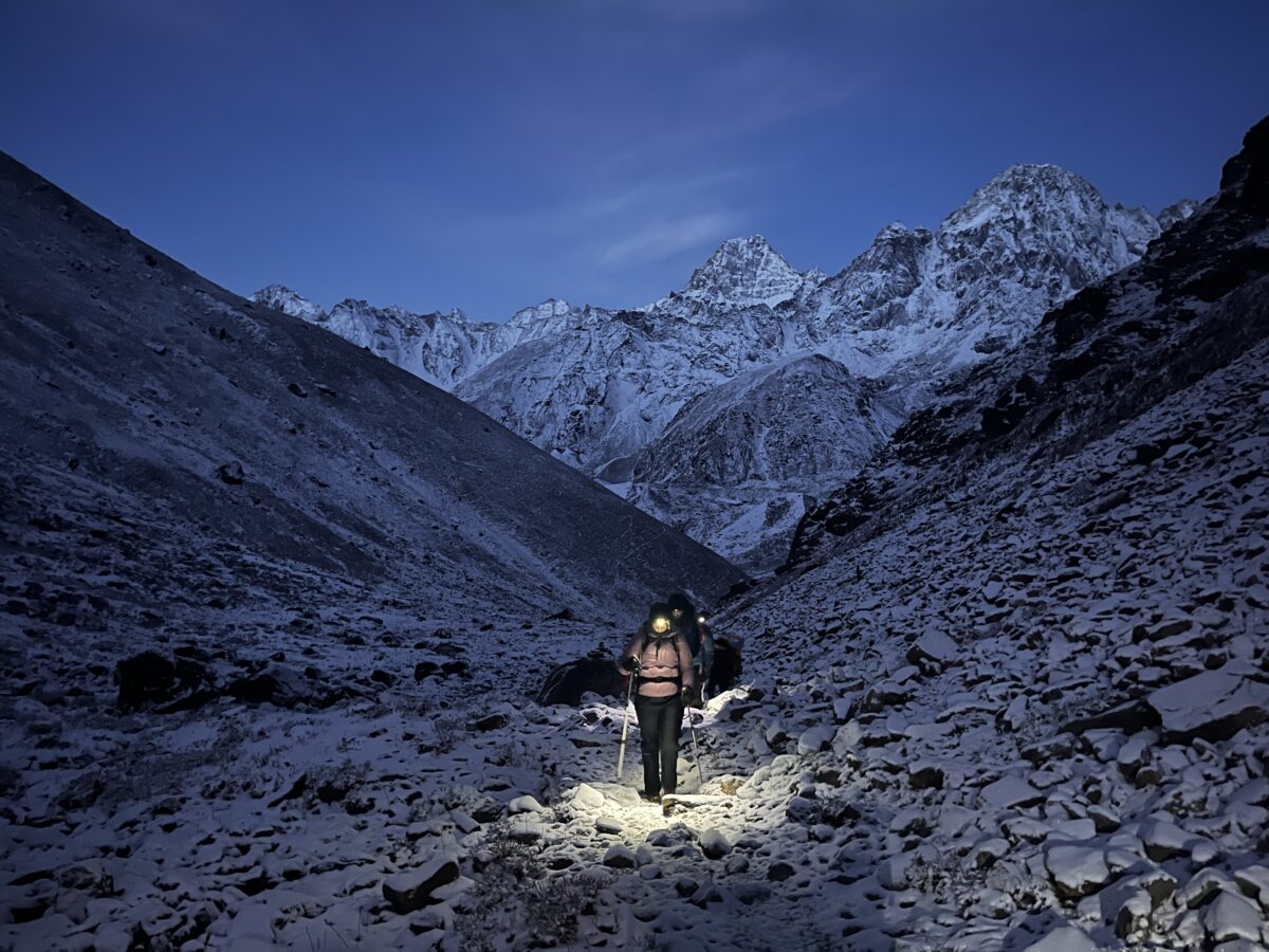 Very early morning hike with headlamps. Himalayas reach to skies just turning blue.