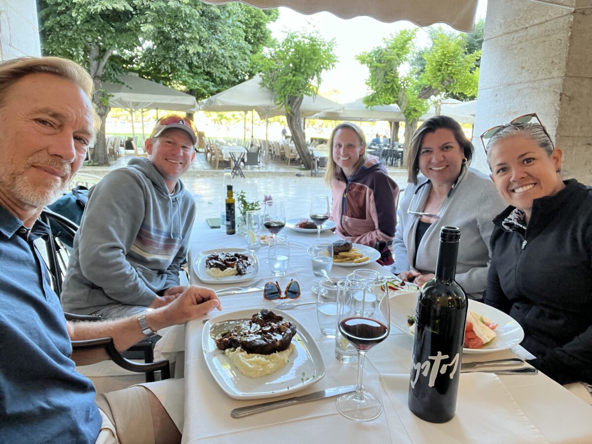 Crew enjoys a meal on land before setting sail.