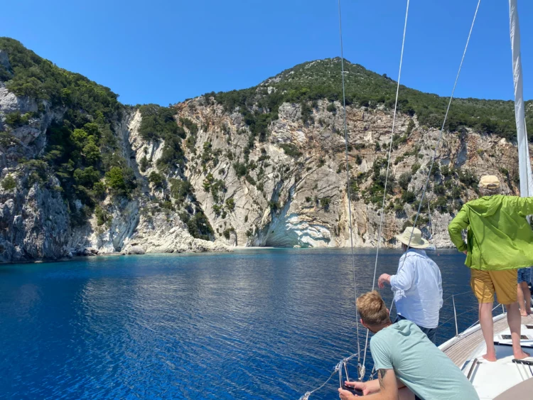 Sailors look towards shore