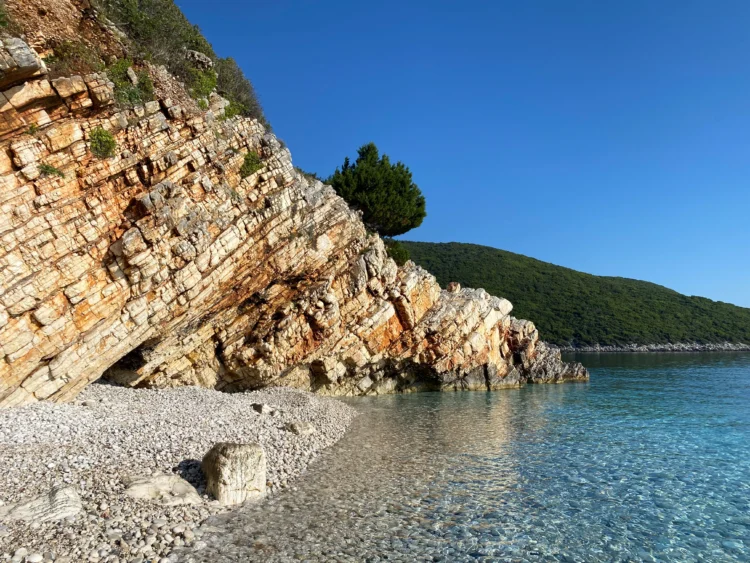 Blue water and cliffs