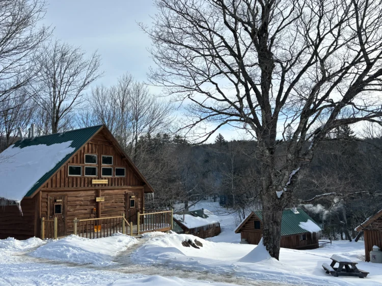 Lodges covered in snow in Maine