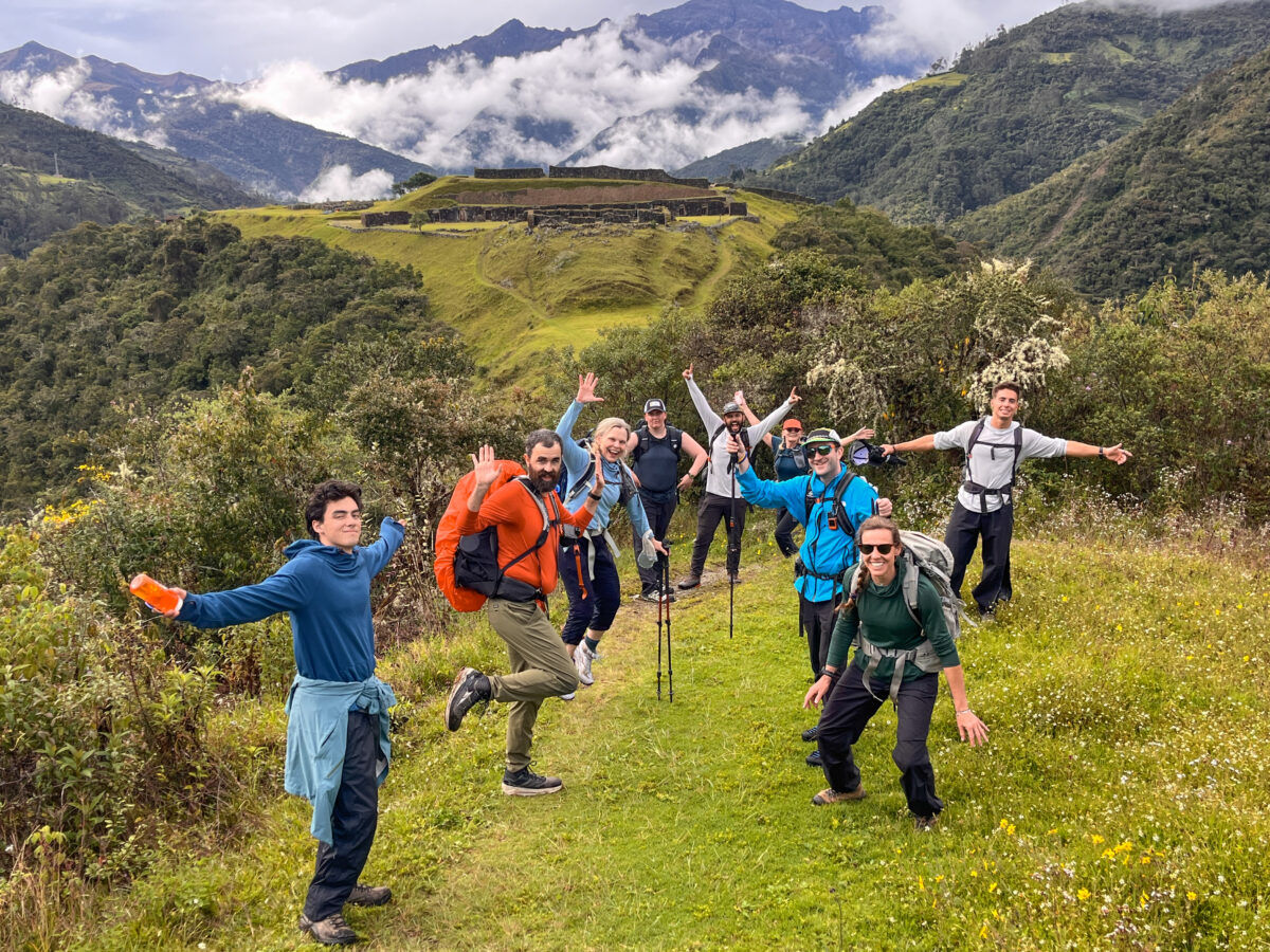 Inaugural course members on Machu Picchu alumni trip celebrate