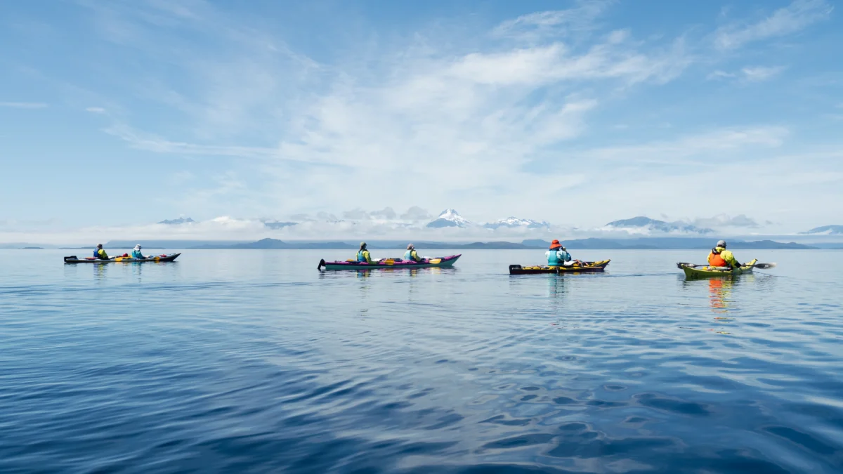Sea kayakers paddle in Chile