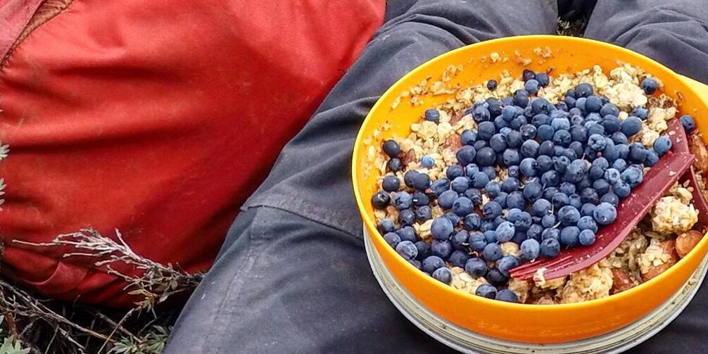 julia-sachs-ak-45.jpg__1400x503_q70_crop_subject_location-918,1056_subsampling-2_upscale Enjoying a freshly picked addition to breakfast in the Chugach Mountain Range in Alaska.